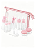 11-piece pink travel bottles set with clear toiletry bag