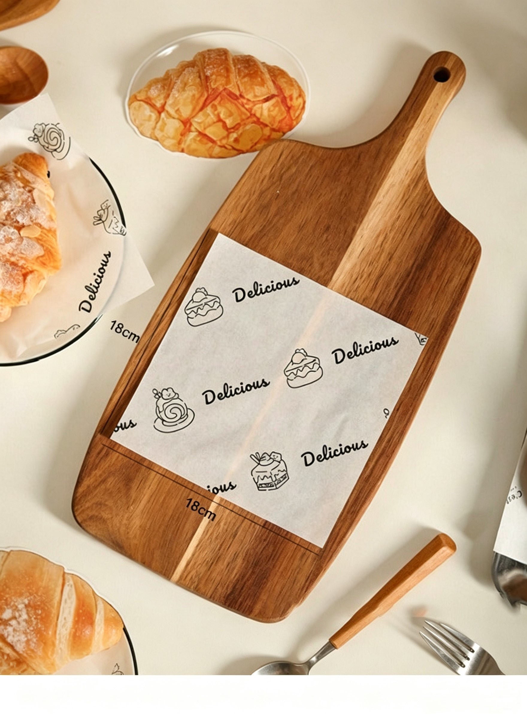 Wax paper sheet on wooden cutting board with bread